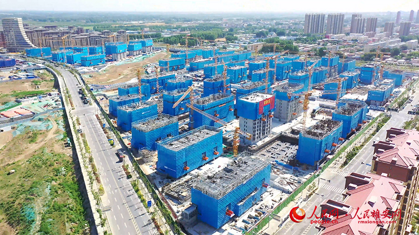 容西片區F單元安置房及配套設施項目F5標段建設現場。中冶建工供圖