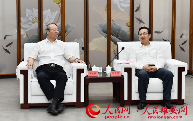 張國華與中國科學院院士雒建斌一行舉行工作座談。劉向陽攝