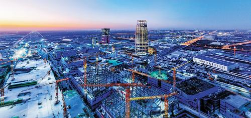 今年1月航拍的雄安國貿中心項目建設現場。雄安新區財政局通過“投建運一體化”模式，吸引經營主體購買雄安集團雄商置業公司30%股權，有效吸引社會資本支持雄安國貿中心項目建設。（本報資料片）雄安新區宣傳網信局供圖